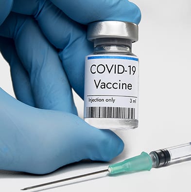Vaccine against coronavirus in phial at third trial phase at medical laboratory in USA.