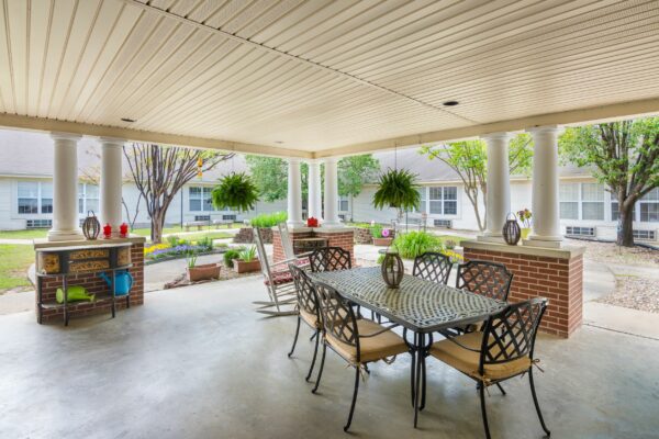 patio with table and chairs overlooking the patio