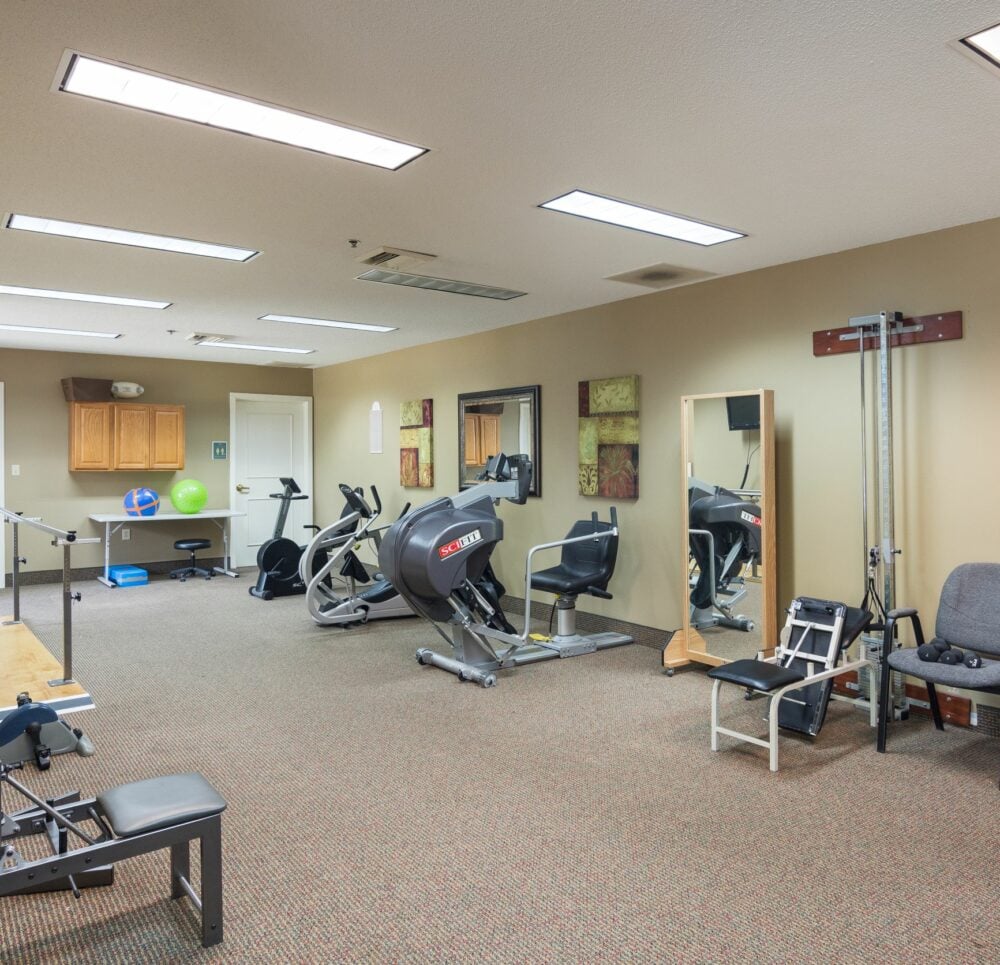 on-site gym that includes weight equipment, bike, and other exercise equipment