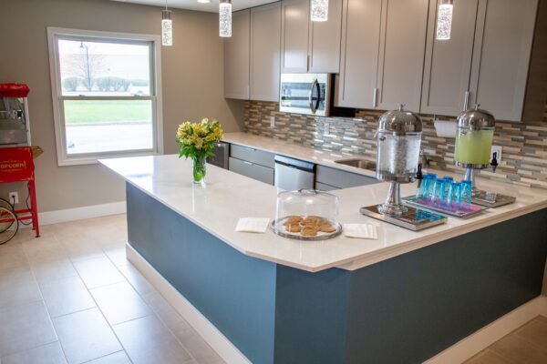 public kitchen area with drinks and snacks