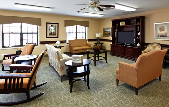 North Pointe senior living community lounge with big screen TV.