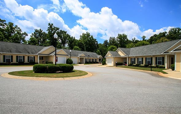 Summit Place senior living cottages with circular driveway.