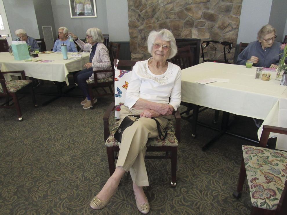 Berni Nonenmacher sits in the The Heritage at the Plains dining room