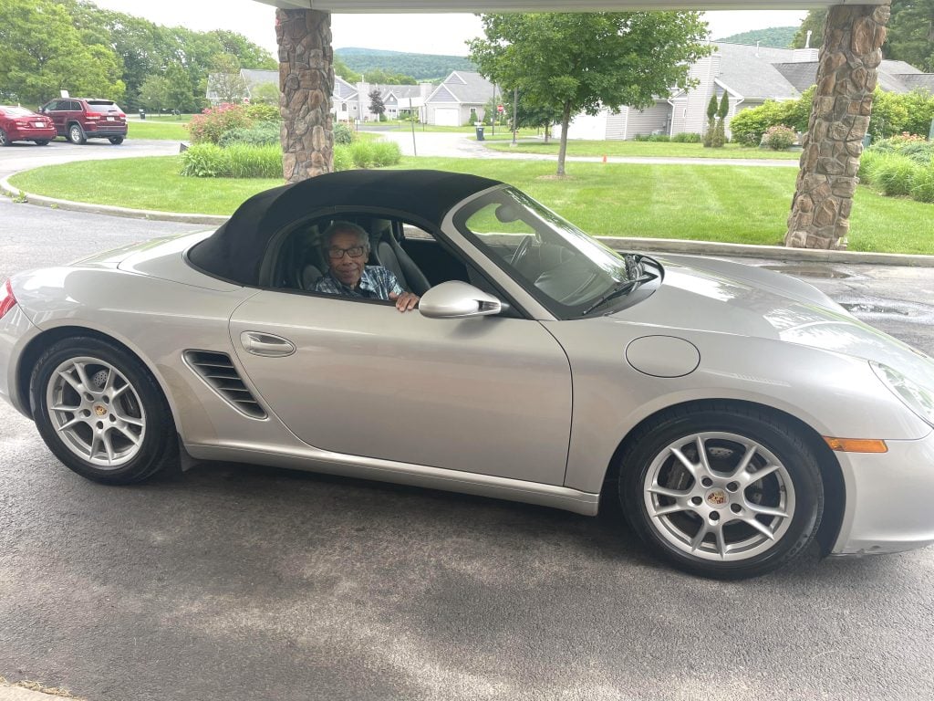 Don Carter gets ready for his ride in a Porsche Boxster, kicking off the new “Tree of Dreams” program.