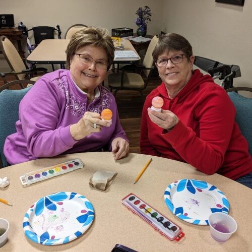 Two women doing crafts