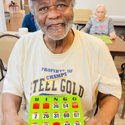 A senior man playing bingo
