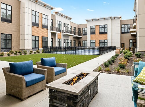 Mayfield courtyard with a fireplace