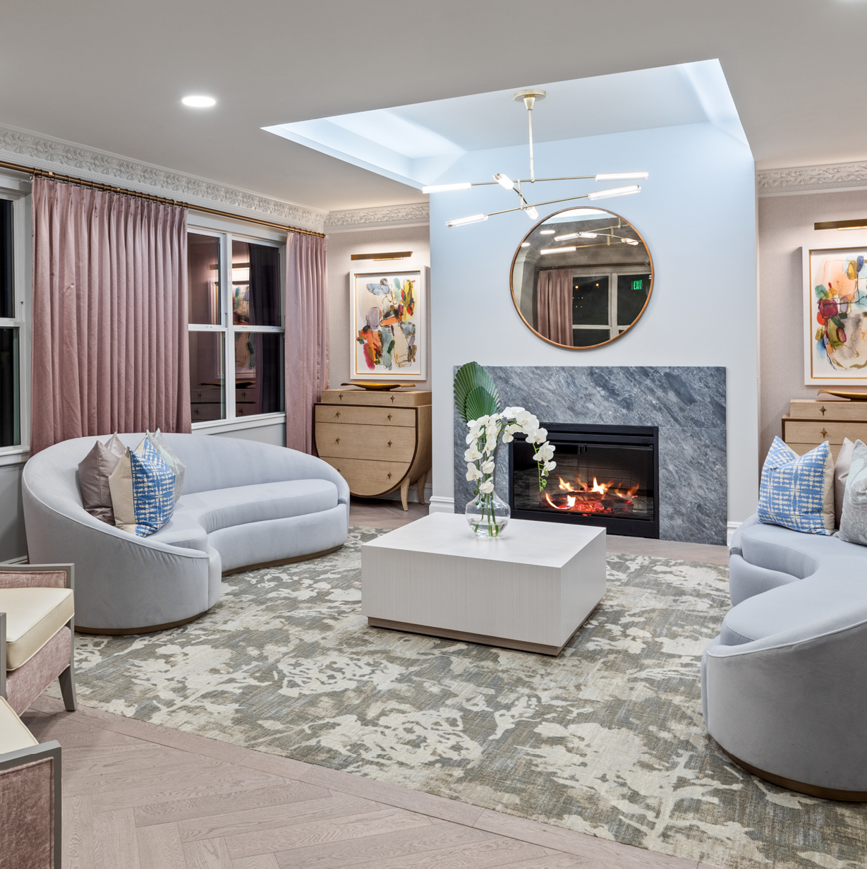 The Ashton on the Plaza front lobby has a fireplace and comfortable couches