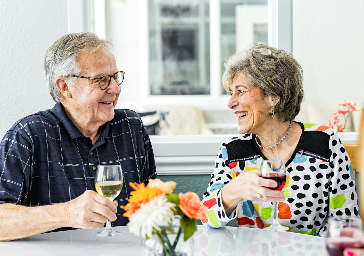 A senior couple eating food