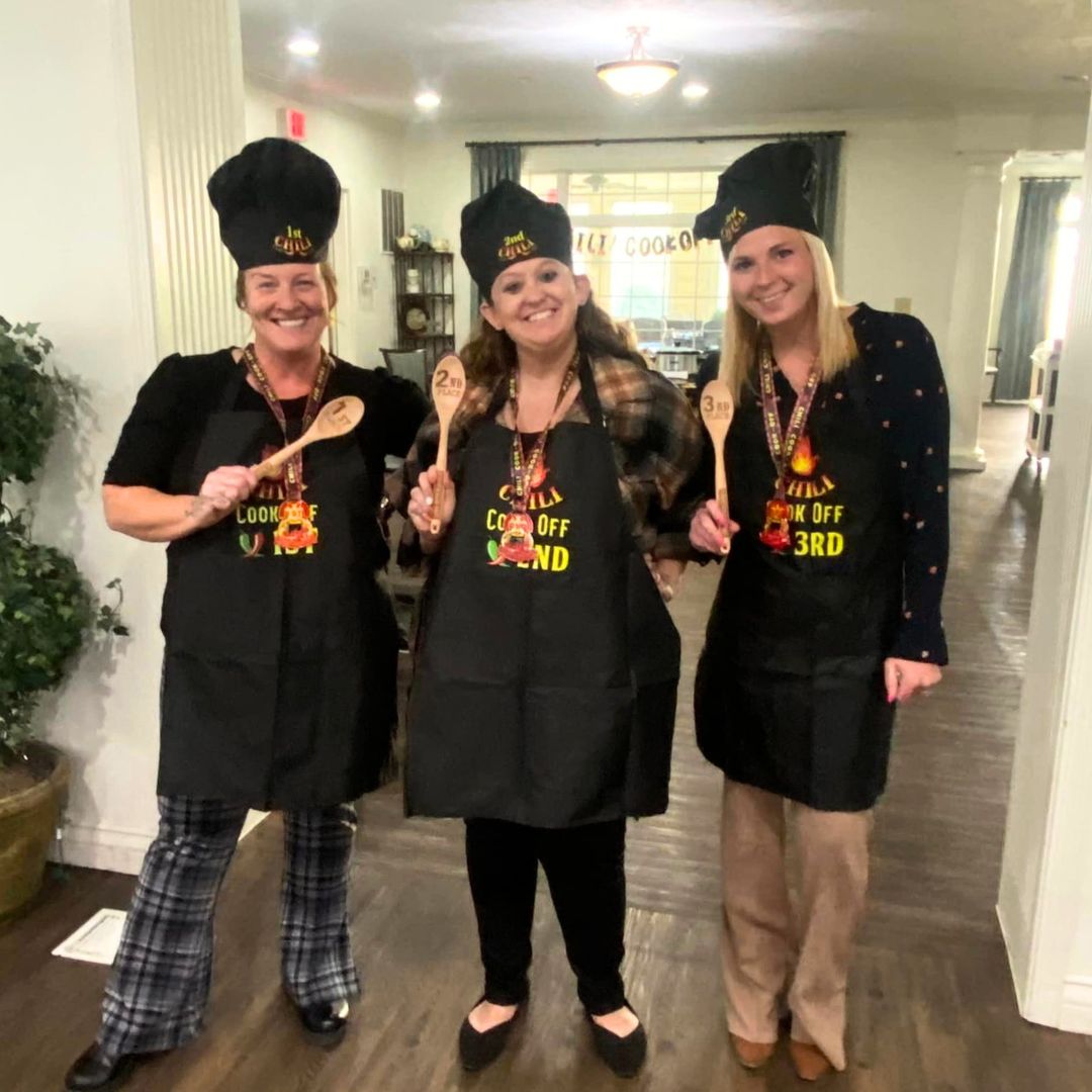 First place, second place, and third runner up for the community's team chili cook-off