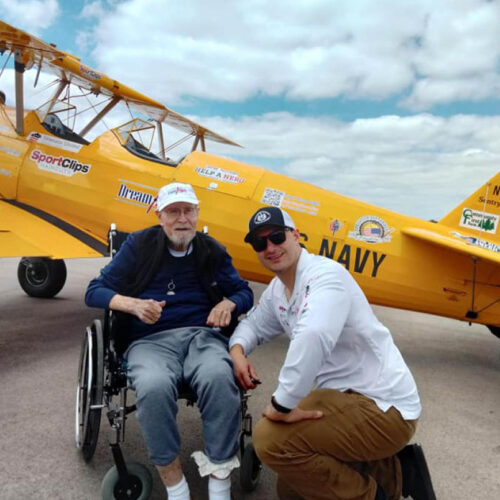 Tree of Dreams fulfilled as a man poses next to a plane he flew