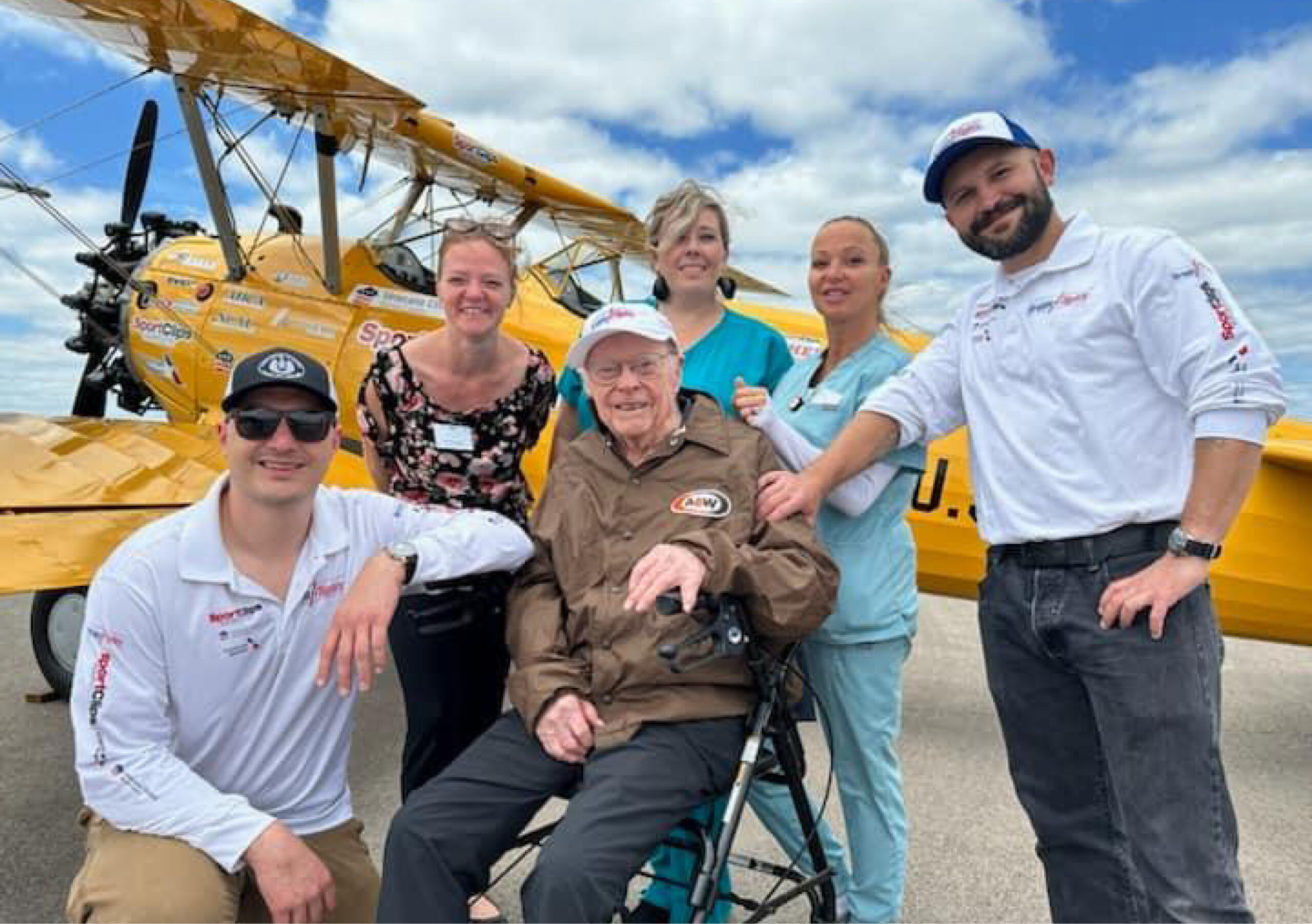 Tree of Dreams fulfilled as a man poses next to a plane he flew