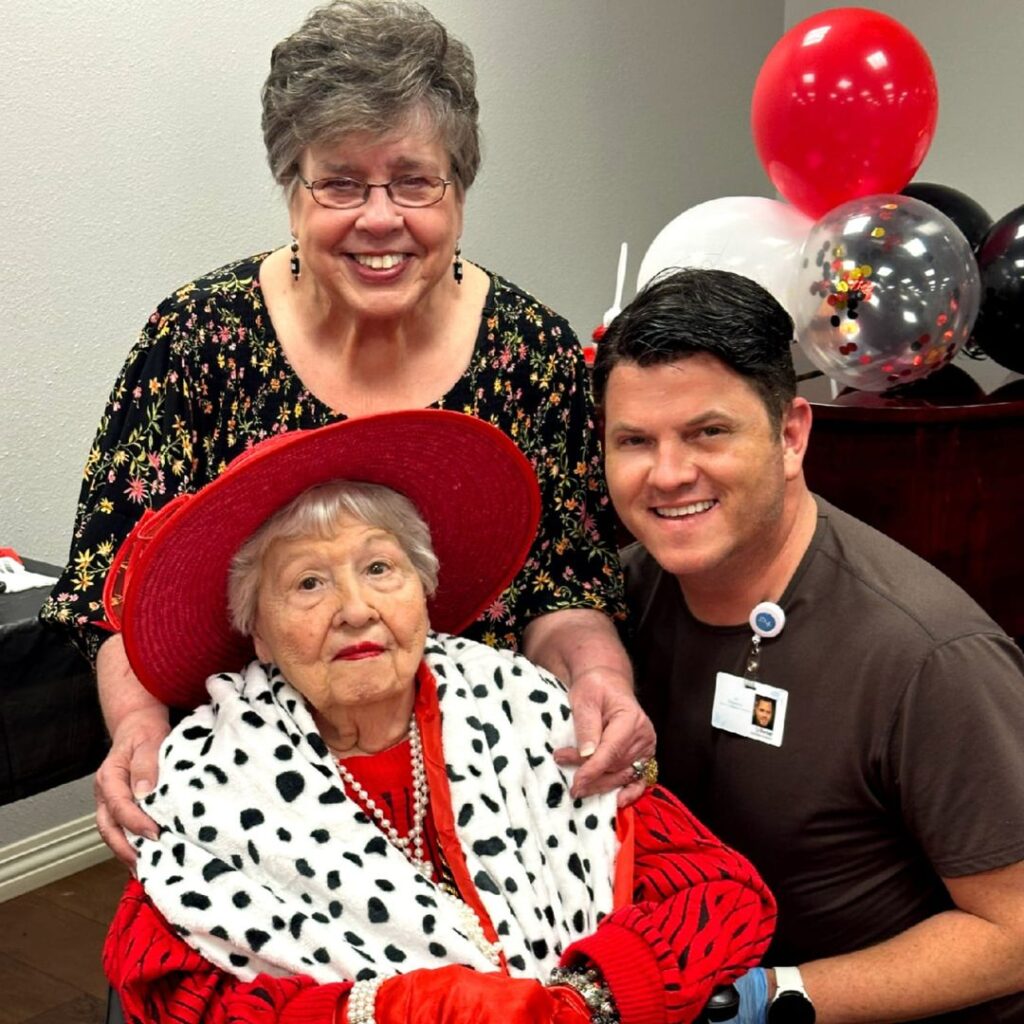 Resident celebrates birthday at her party with family and community team members