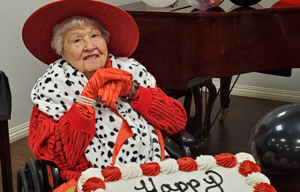 Resident celebrating birthday with cake