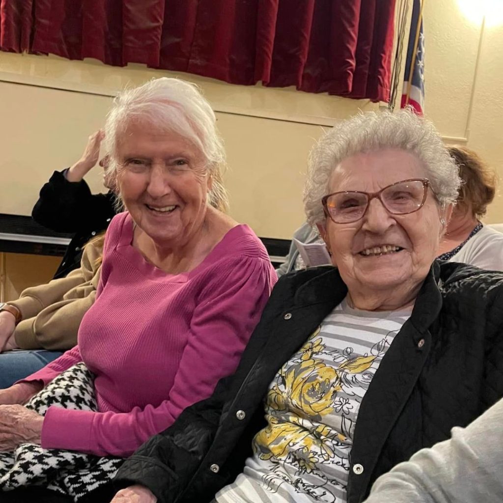 Residents posing in theater before show