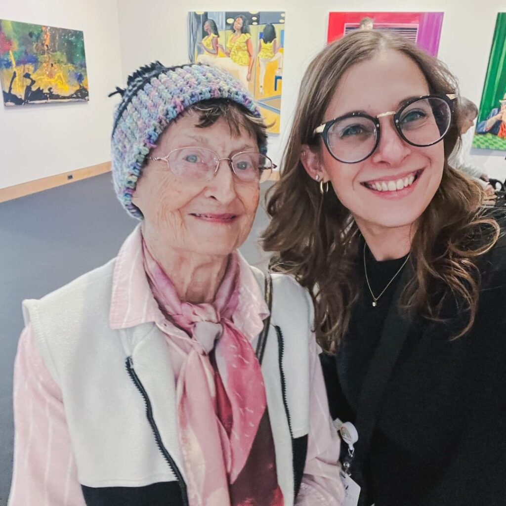 Resident and team member enjoy a day at a local museum