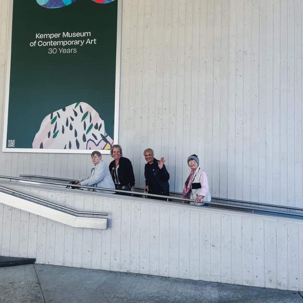 Group of residents enjoying a trip to a local museum