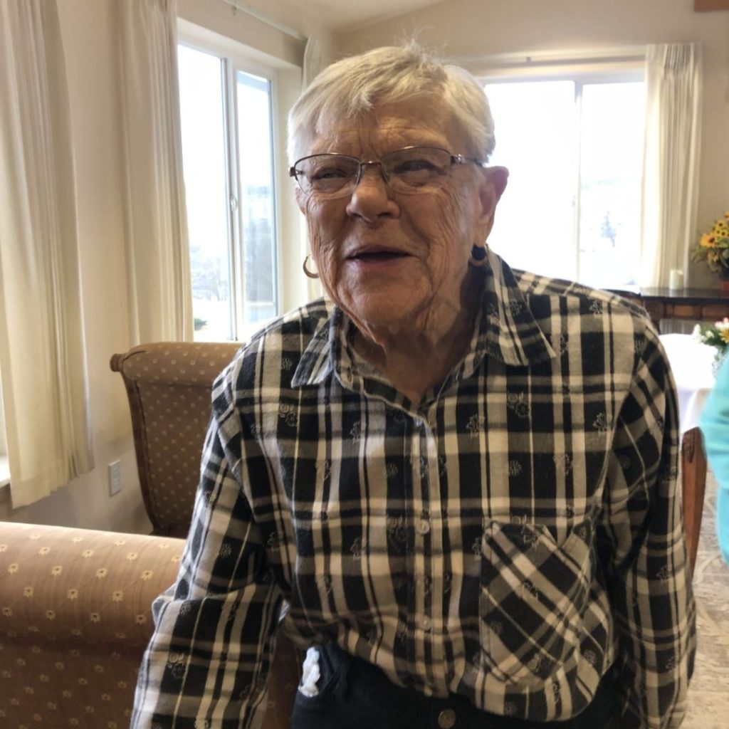 Resident receiving kindness coin