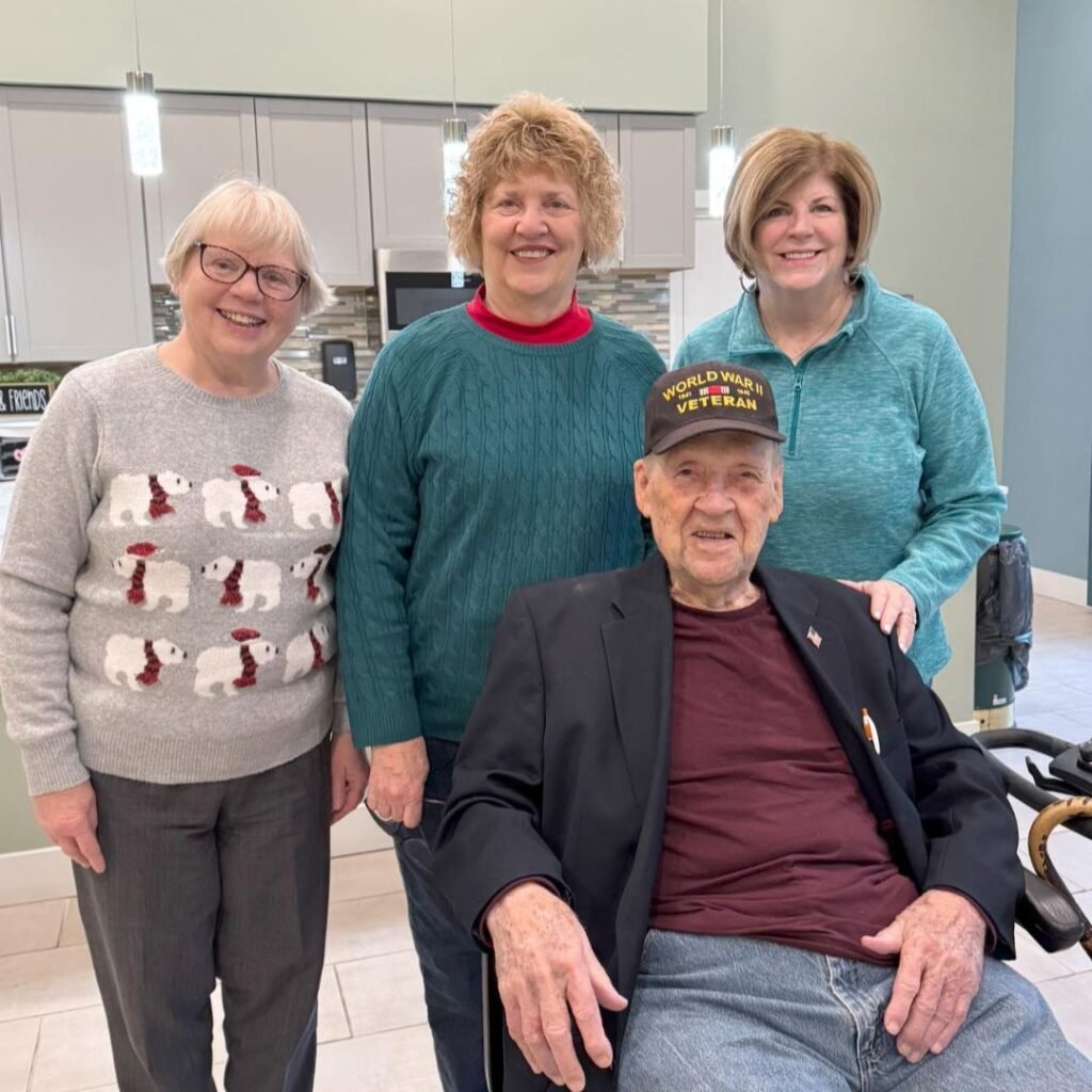 Resident surrounded by family on his birthday