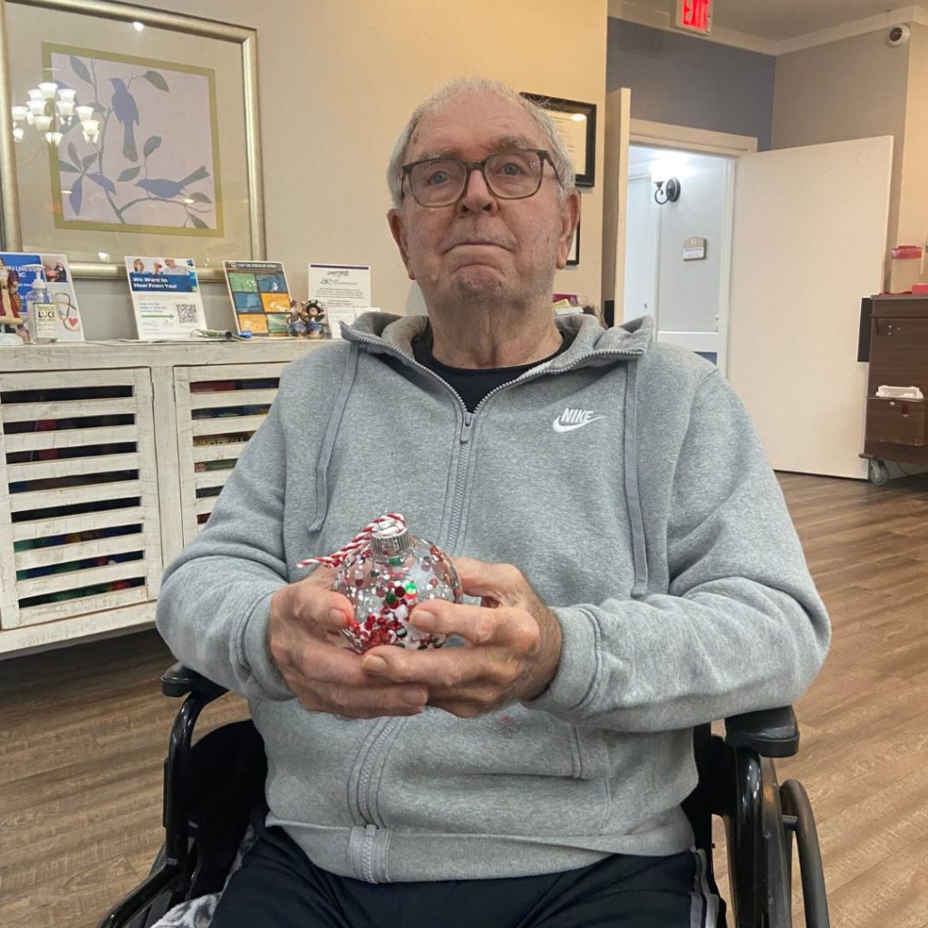 Resident shows up handmade Christmas globe ornament