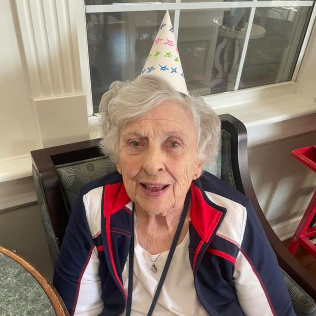 Resident wears hat she created for New Years celebration