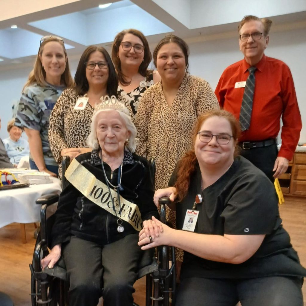 Resident celebrates 100th birthday surrounded by team