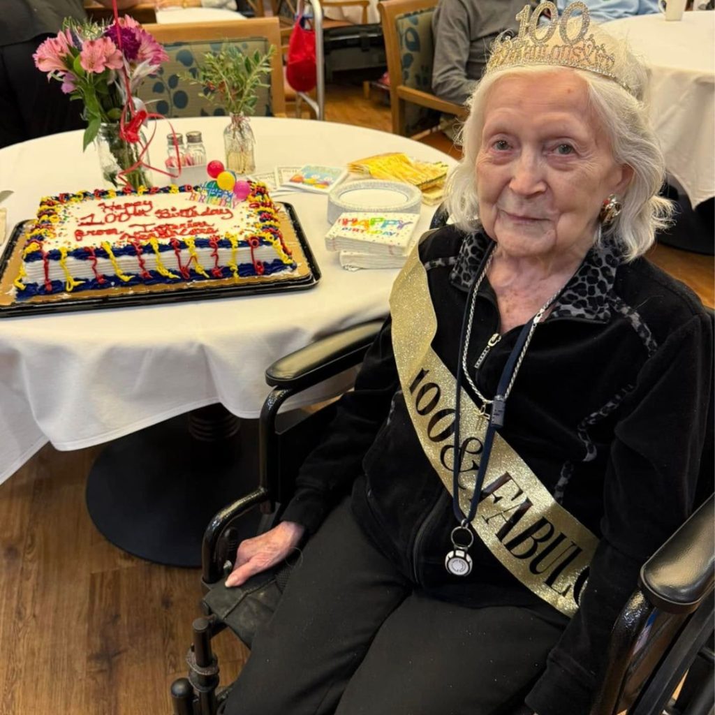 Resident celebrates 100th birthday with cake