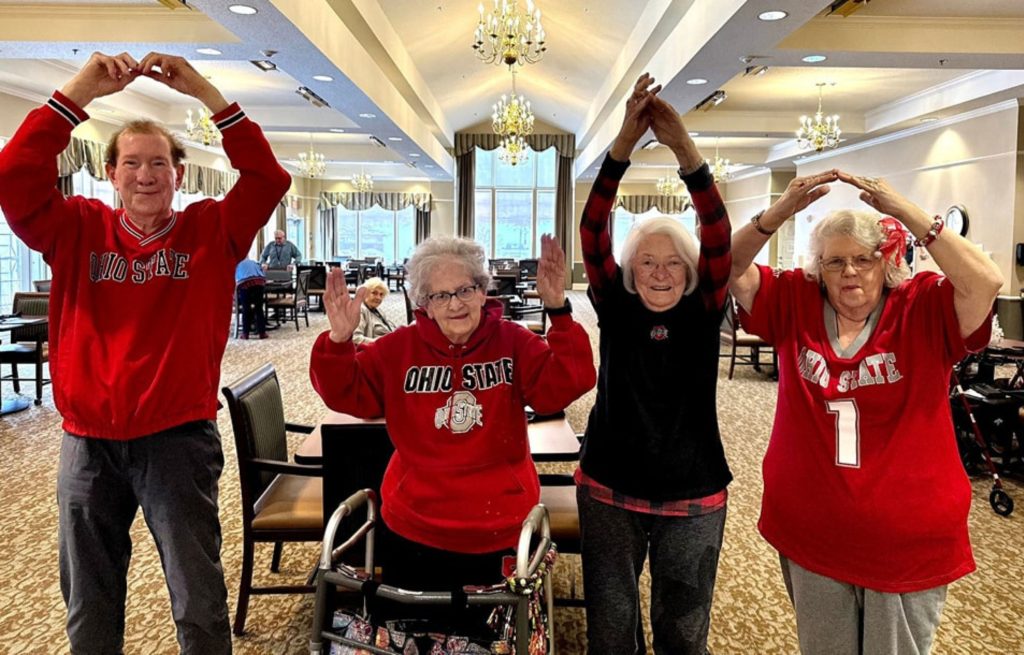 Residents cheer for the Ohio Buckeyes