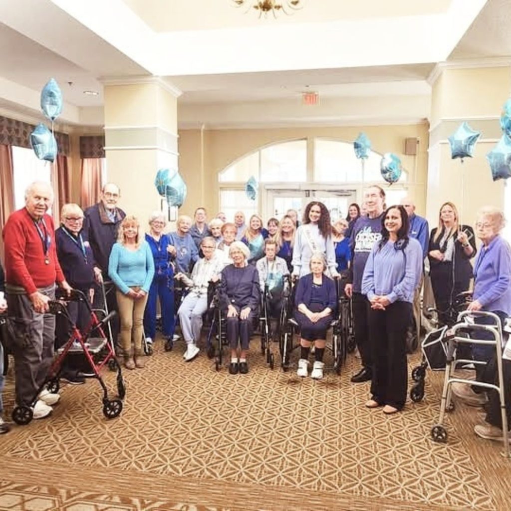 Waterford at Mansfield community residents and team pose for Wear Blue Day