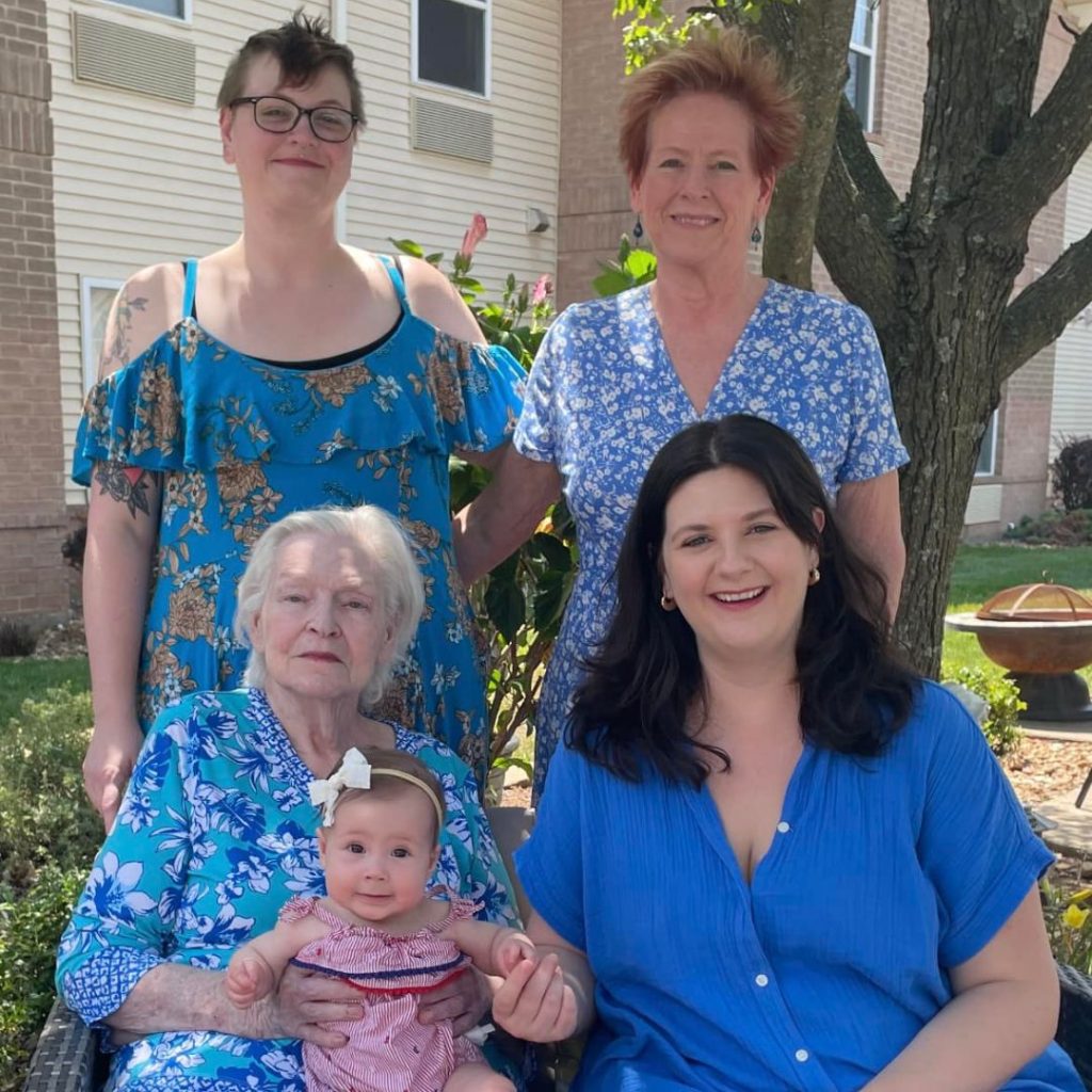 Generations of family pose for photo