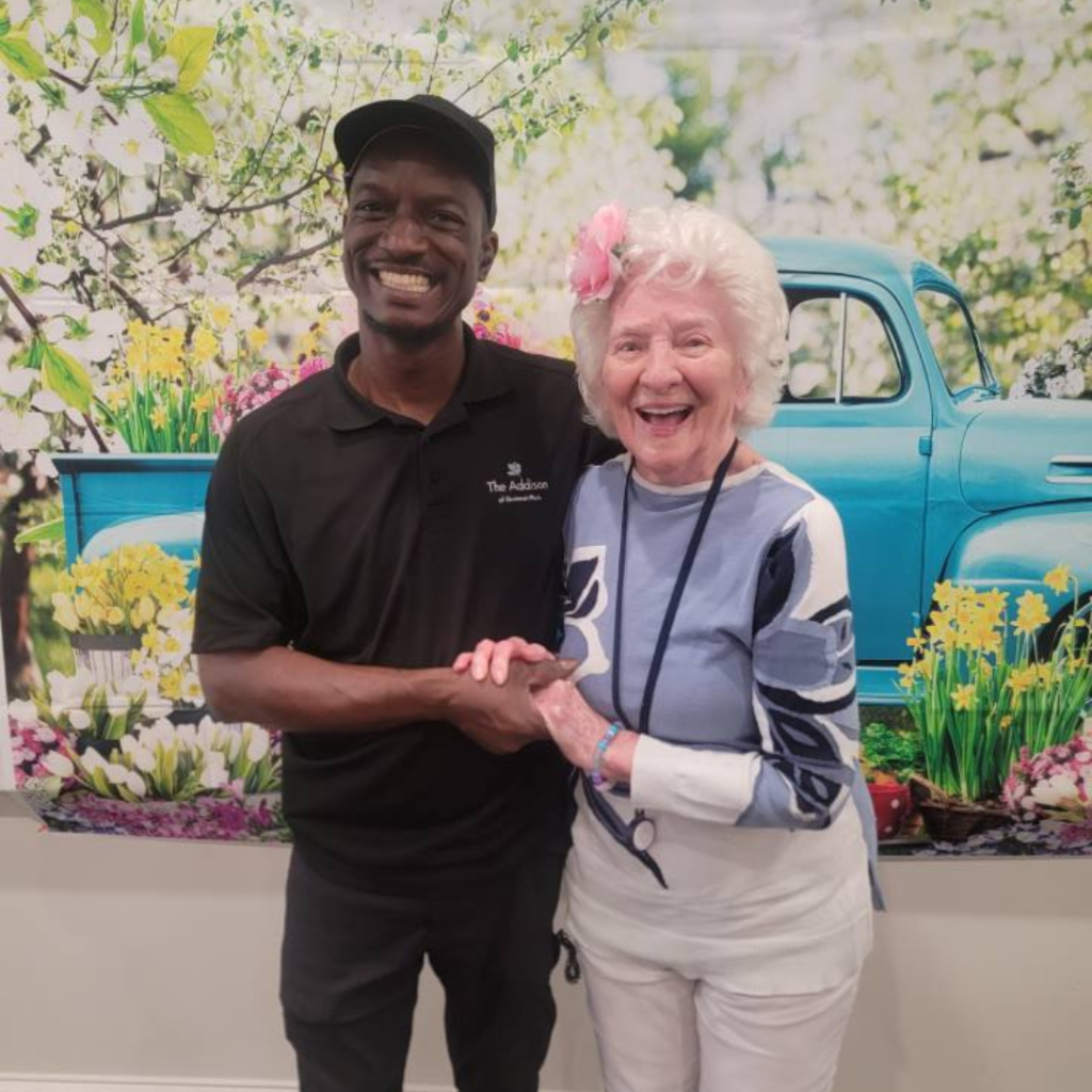 Team member and resident celebrate spring fling