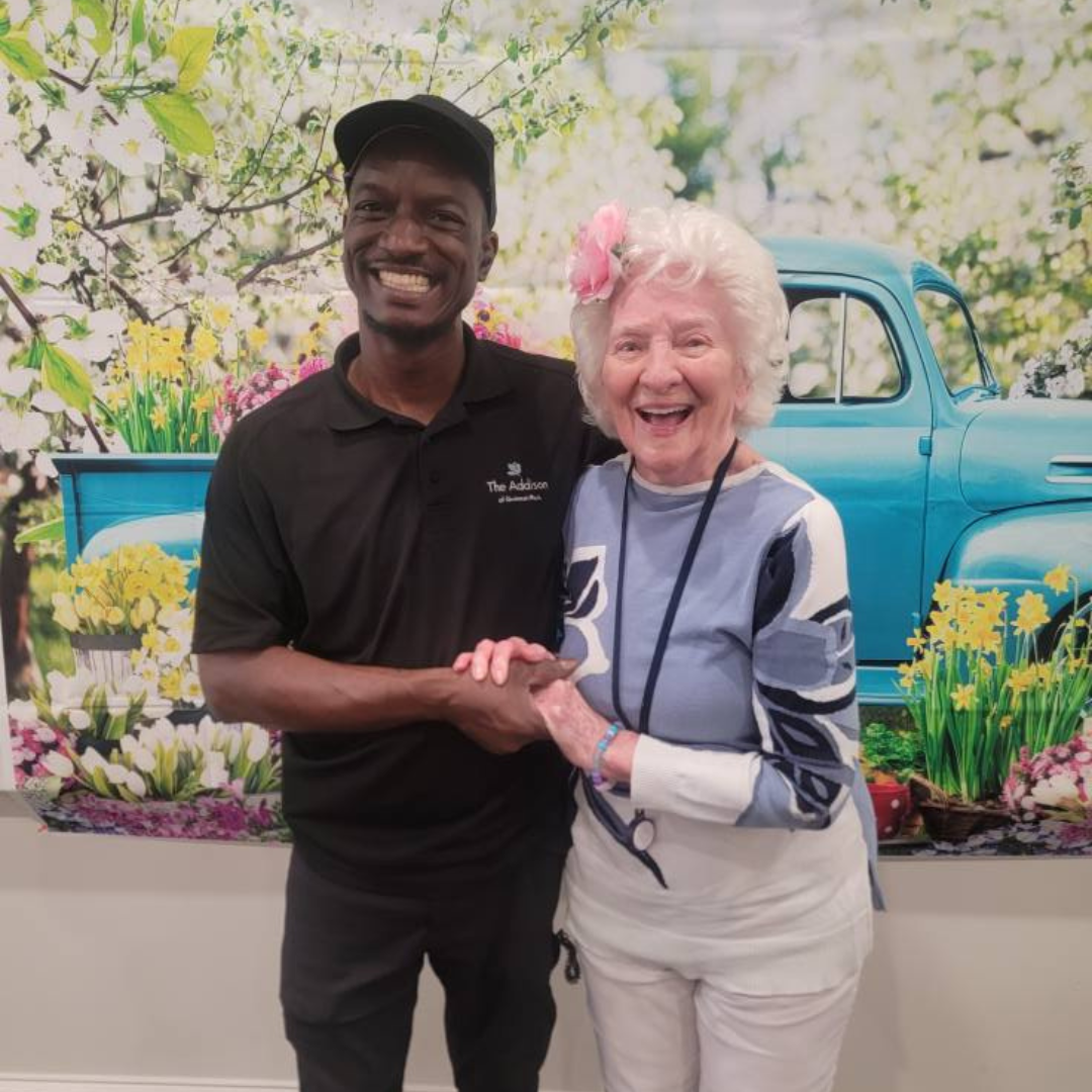 Team member and resident celebrate spring fling