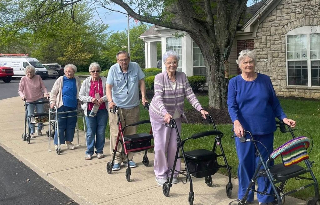 Residents out for a walk at their community