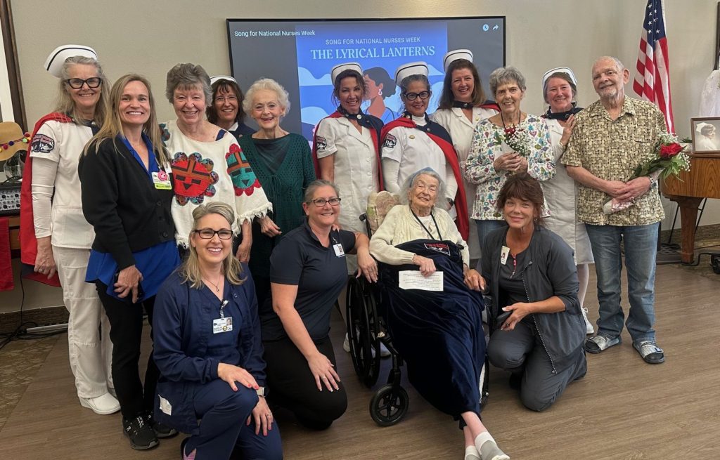 Nurses pose with residents for Nurses Week