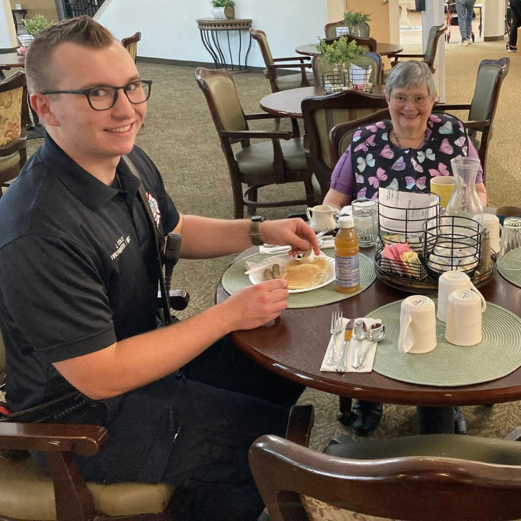 Resident has breakfast with first responder