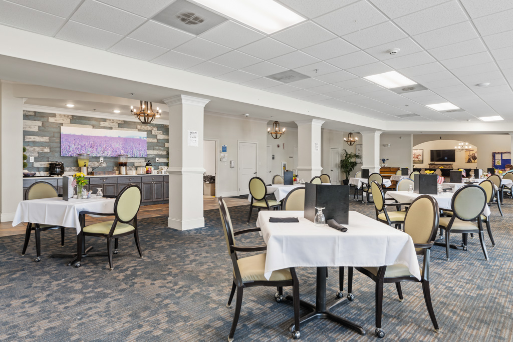 Dining area with comfortable seating at The Addison of Alpharetta in Alpharetta, GA.