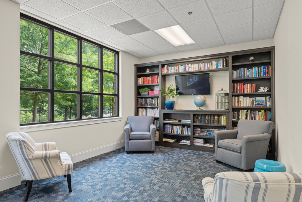 Cozy library and reading space at The Addison of Alpharetta in Alpharetta, GA.