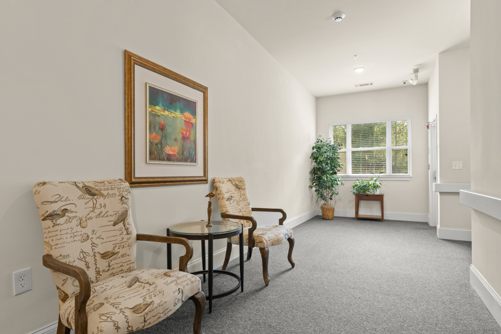 Shared common living space at The Addison of Alpharetta community.