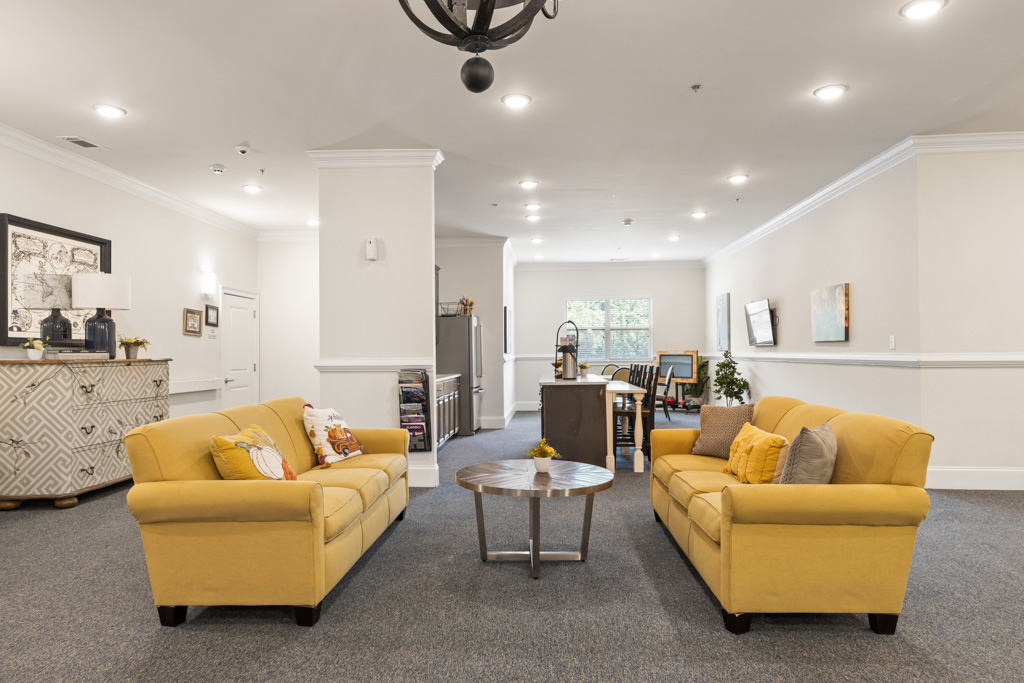 Resident lounge and shared space at The Addison of Alpharetta senior living.