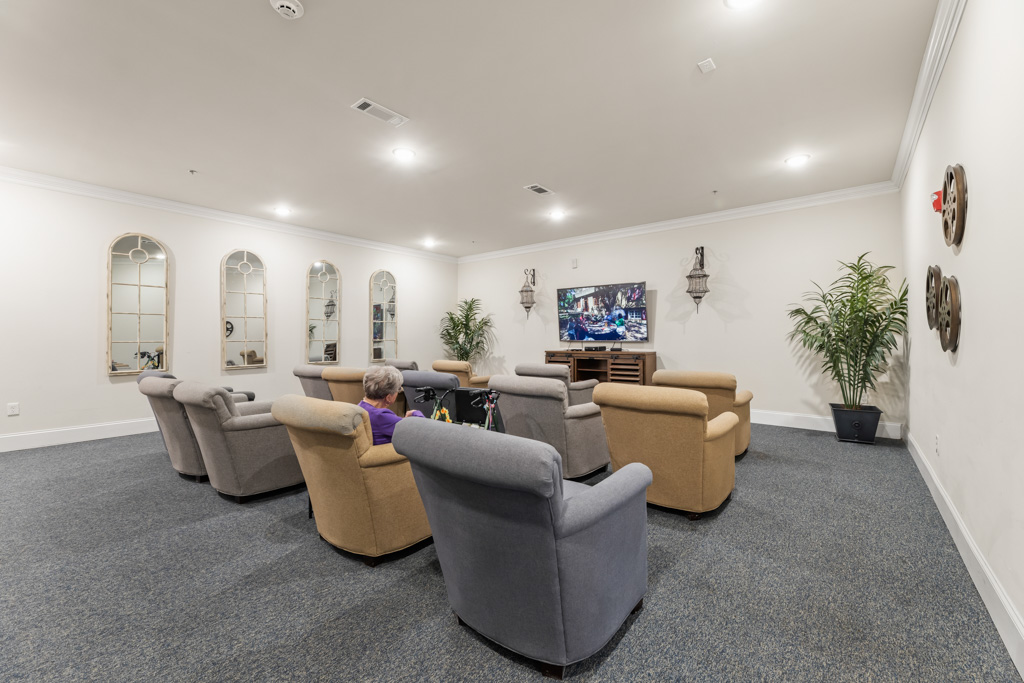 Movie theater room for residents at The Addison of Alpharetta senior living in Georgia.