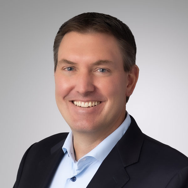 Headshot of Brandon Ribar, President & CEO