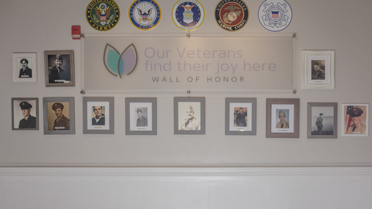 Whispering Pines Village Interior WallofHonor 01